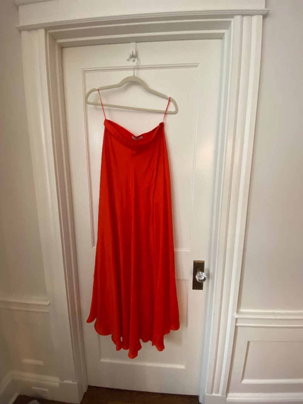Farrow Lazaro bias cut long red skirt with a high slit